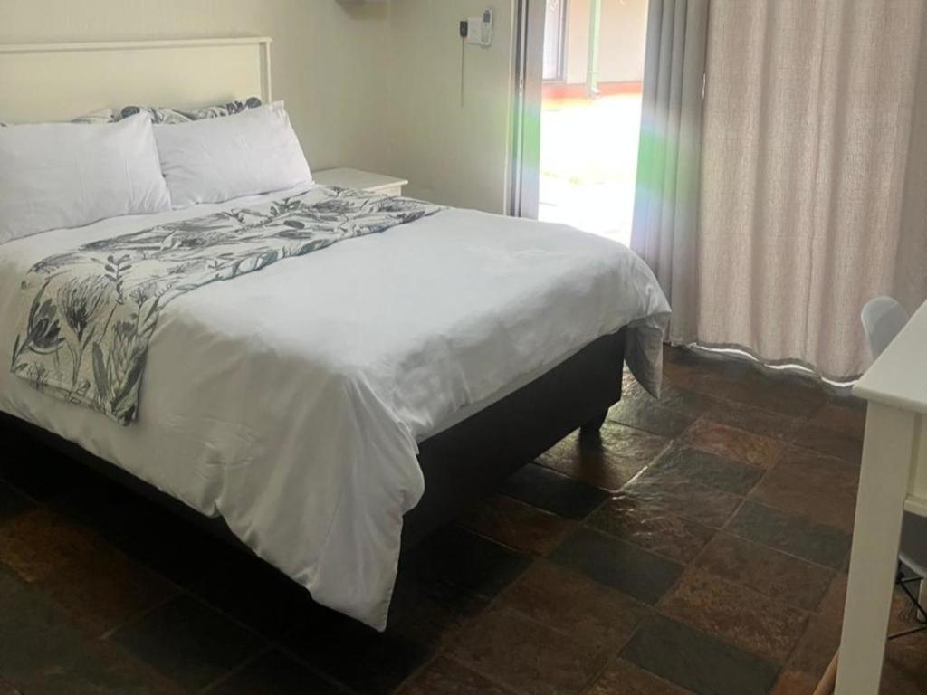 Karee Guesthouse Тхабазимби Номер фото